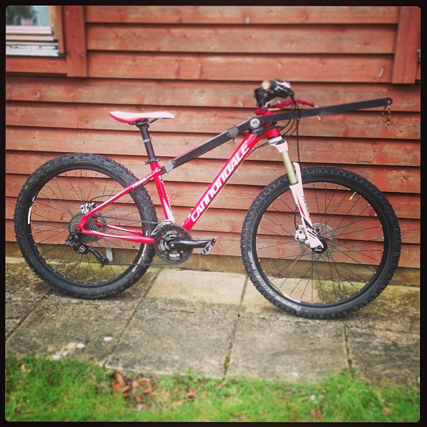 A reasonable spec mountain bike with front suspension - known as as 'hardtail'